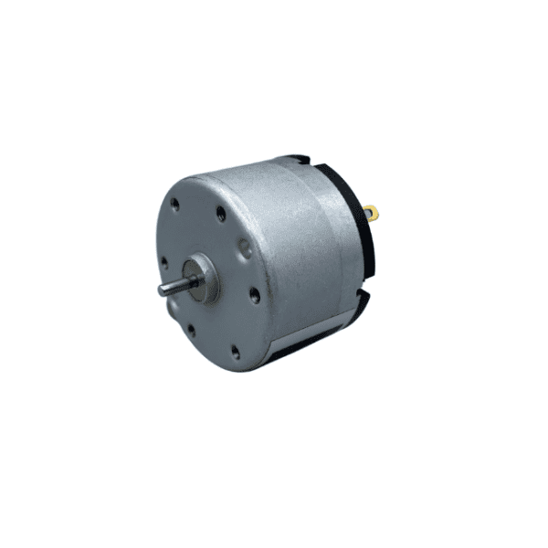 Small electric DC motor isolated on white background.