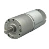 Small industrial electric motor on white background.